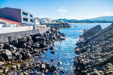 Wall Mural - A view down the coast beside the Dog Face islet on the island of San Miguel in the Azores in summertime