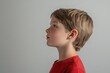 © AAndi - Profile Portrait of a Thoughtful Boy in Red Shirt