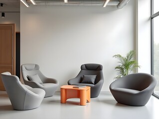 modern organic shaped  lounge chairs and sofas  upholstered in solid light grey and anthracite textiles and light orange powdercoated lap top tables with computers photographed in a modern office