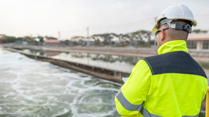 Wall Mural - Environmental engineers work at wastewater treatment plants,Water supply engineering working at Water recycling plant for reuse