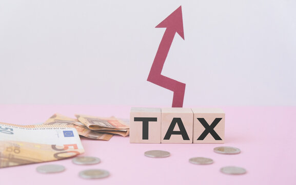 tax increase, text on wooden cubes