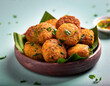 © Arda ALTAY - Crispy Aloo Tikki, pakora/pakoda or pattice also known as potatoes  cutlet on wooden bowl. selective focus