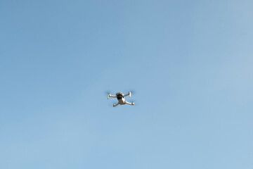 Wall Mural - the drone flies against the blue sky