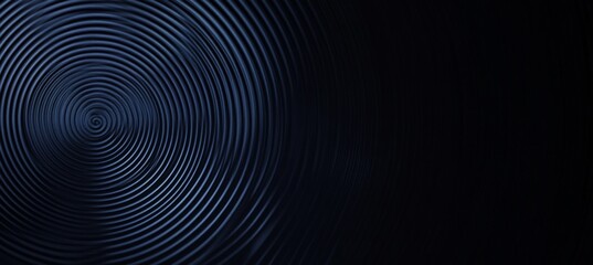 A background graphic featuring dark blue and black tones, with lines forming circles 