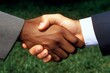 © Sanchai - Close-up of hands shaking, representing a professional agreement or partnership in business consulting, symbolizing trust and professionalism