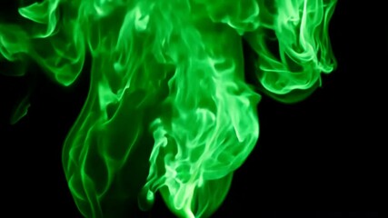 Wall Mural - emerald inferno: abstract green flames dance on black background