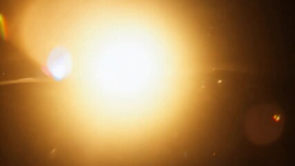 Wall Mural - golden light flare: a mesmerizing abstract photo of a bright golden light flare with soft, diffused 