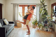 © peopleimages.com - Couple, romance and lifting woman in home, support wife and love in relationship or fun. People, feet and bonding in apartment for care in marriage, connection and holding for care in partnership