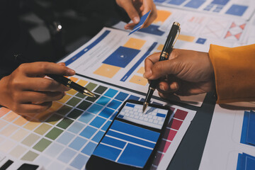The designer team is designing the uxui system to make the uxui system work well on new phones and support system updates. Website development concept UI UX front end designer