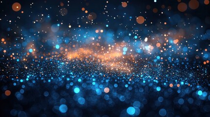 Poster - Bright blue and orange shimmering particles create a mesmerizing abstract background in a dark setting at night