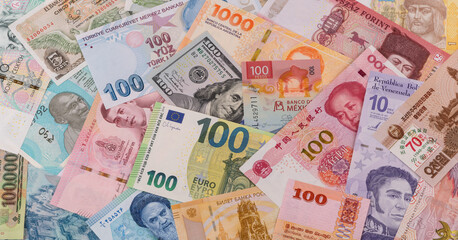 Wall Mural - Many banknotes from different countries of the world of different denominations