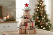 © olyphotostories - Christmas tree shape made from festive gifts. Christmas and new year concept