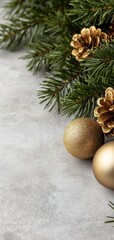 Decorative Christmas arrangement with golden ornaments and pinecones on a festive background.