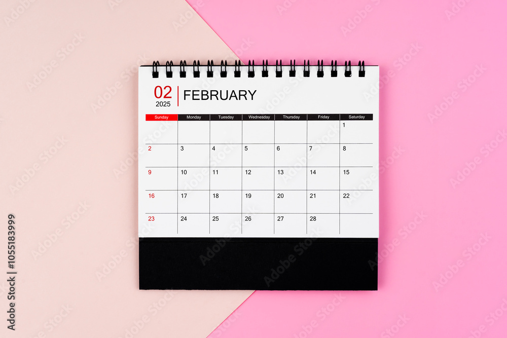 February 2025 desk calendar on pink background. Page of annual monthly ...