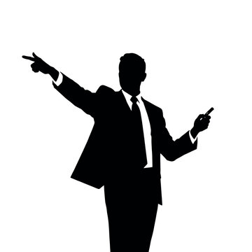 A businessman silhouette pointing towards a whiteboard