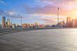 © ABCDstock - Empty square floor with modern residential area buildings scenery at sunset. car background.
