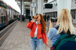 © bernardbodo - Woman drinking coffee by the train