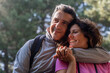 © Lomb - Romantic mature couple embracing outdoors, enjoying nature and connection