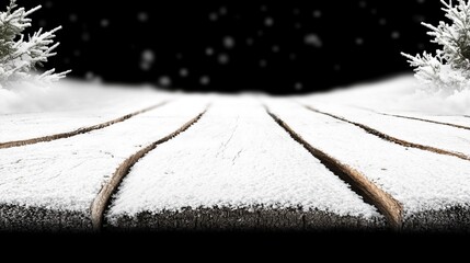  A monochrome image of a snow-laden landscape featuring a solitary tree at its center, as flakes gently descend