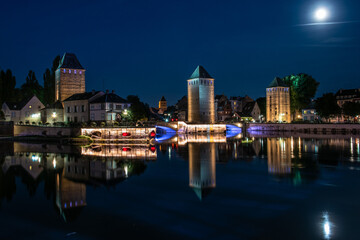 Strasbourg, medieval bridge Ponts Couverts. Alsace, France. Night view.