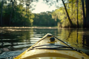 Wall Mural - yellow kayak on water