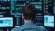 © nattapon98 - A person analyzing data on multiple computer screens, focusing on graphs and statistics in a tech-driven environment.