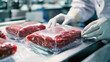 © sabyna75 - Hygienic packaging process of fresh meat for food industry safety