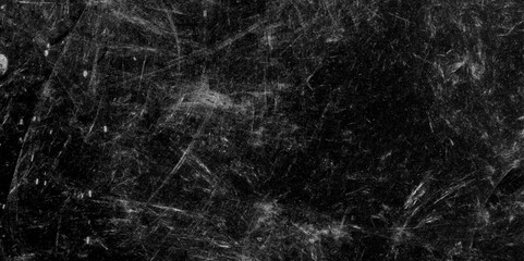 Poster - Abstract Dark black stone wall grunge aged rough texture background. closeup texture of black color. Gray concrete cracked walls in the background. White and black messy wall stucco texture background