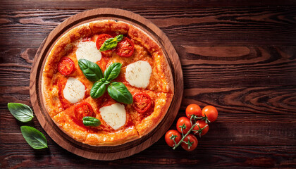 Margherita pizza on wooden table