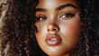 © Natalia Klenova - Close-up portrait of a young woman with curly hair