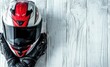 © Ruslan - Motorcycle gear on white table with copy space