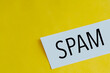 © Pawel - note paper with the word 'spam' on a yellow background with space for copying