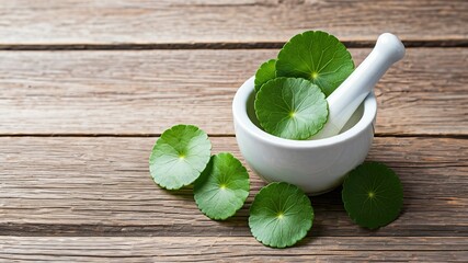 Centella Asiatica Leaves with Mortar and Pestle on Wooden Surface