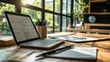 © Juan - A modern home office workspace featuring a sleek laptop and neatly arranged stationery items for enhanced productivity