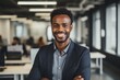 © CojanAI - Smiling portrait of a young African American businessman in office