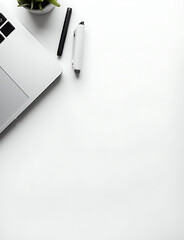 Aufkleber - Laptop and pens on white desk in a flat lay setup with plenty of empty space around it.