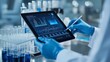 © Tondone - A scientist using a tablet in a laboratory, analyzing data on a digital screen with test tubes in the background.