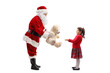 © Ljupco Smokovski - Santa Claus giving a teddy bear to a girl for christmas