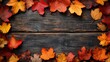 © Vlad Kapusta - top view of wooden background with autumn leaves