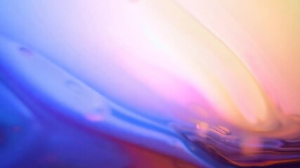 Poster - Colorful liquid paint mixes and forms beautiful shapes and bubbles, creating an abstract background filled with vibrant textures and dynamic patterns