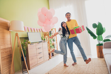 Photo of positive charming couple married people celebrate anniversary valentine day indoors flat