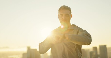 Sticker - Man, athlete and runner in city as tired for workout, exercise and fitness with lens flare. Mature person, pride and sunrise in training, wellness and hiking for strong muscle, cardio and endurance