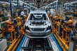 © dyshlivenko - In a busy manufacturing facility, robotic arms work efficiently to assemble a silver car on the production line. Skilled workers oversee the process to ensure quality and precision