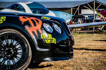 Front of a black car with airbrushing