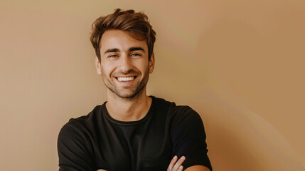 Poster - Happy, smiling, handsome man with crossed arms looking at the camera over a beige background