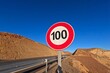 © Oualid - Speed Limit 100 kilometers Road Sign