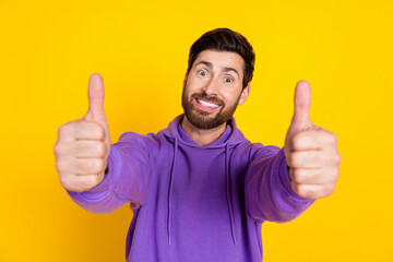 Aufkleber - Photo of nice man with stylish bristle dressed purple hoodie showing you thumbs up approve good work isolated on yellow color background