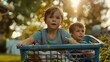 © Mahemud - Kids enjoying a ride in a laundry basket.