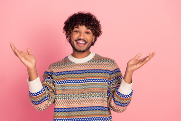 Portrait of nice young man communicate welcome wear sweater isolated on pink color background