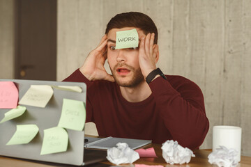 Poster - Multitasking And Deadline. Office Manager Touching Head In Shock Having Too Much Work And Sticky Notes Everywhere Sitting Indoor.